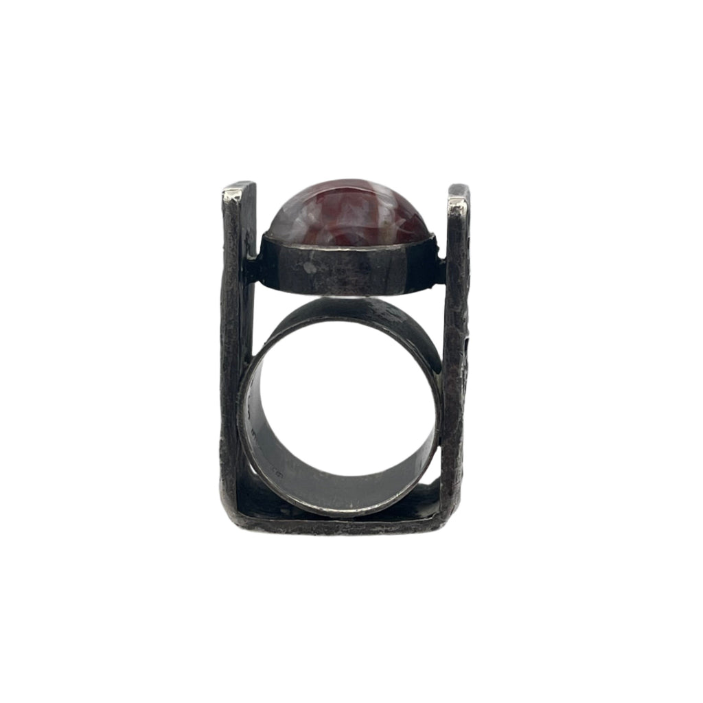 Rectangular Estate signed Walter Schluep solid sterling silver ring, brutalist style with reddish brown resin cabochon.