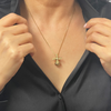 Lovely vintage 14k yellow gold rotary windmill charm with moving sails.
