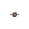 Lovely 14K yellow gold ring. A beautiful opal is set in the heart of the flower and 8 small garnets serve as petals in an openwork decor.